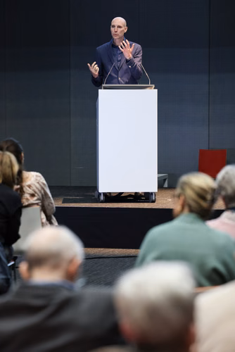 Séance d'information et de présentation des résultats de recherche sur la maladie de Parkinson au Campus Biotech Genève.