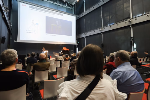 Séance d'information et de présentation des résultats de recherche sur la maladie de Parkinson au Campus Biotech Genève.