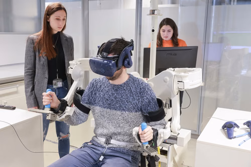 EPFL scientists show that breathing may be used to control a wearable extra robotic arm in healthy individuals, without hindering control of other parts of the body.