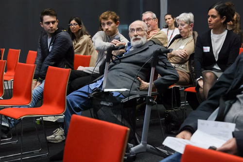 Séance d'information et de présentation des résultats de recherche sur la maladie de Parkinson au Campus Biotech Genève.