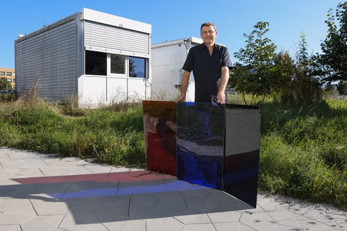 An EPFL study shows red light, like blue, causes stronger glare than white, challenging the century-old and globally used function that describes how the human eye responds to different light wavelengths. The findings have implications for standards and research, as well as for the comfort of building occupants. Senior scientist Jan Wienold with the colored filters used during the experiment.
