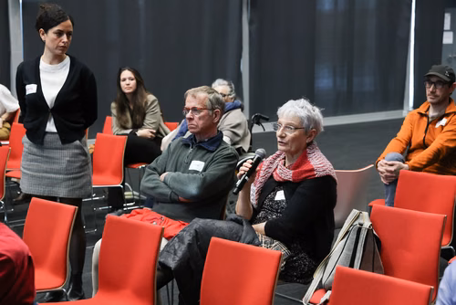 Séance d'information et de présentation des résultats de recherche sur la maladie de Parkinson au Campus Biotech Genève.