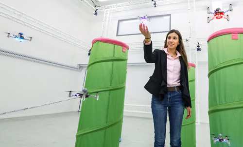 Engineers at EPFL have developed a predictive control model that allows swarms of drones to fly in cluttered environments quickly and safely.
