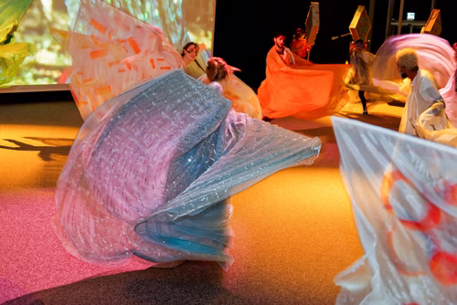 Parade - an artistic performance by Emmanuelle Antille, More than 70 shimmering costumes will be paraded by musicians, dancers, singers and extras. The parade will take place in silence through the hallways of the Rolex Learning Center and then finish to the sound of tambourines and music in the Forum.