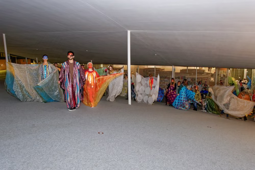 Parade - an artistic performance by Emmanuelle Antille, More than 70 shimmering costumes will be paraded by musicians, dancers, singers and extras. The parade will take place in silence through the hallways of the Rolex Learning Center and then finish to the sound of tambourines and music in the Forum.